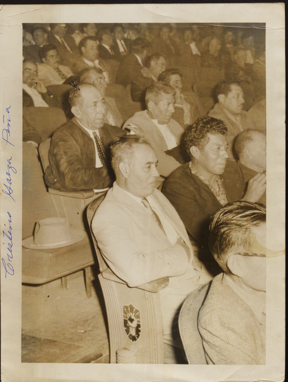 A group of people sitting in chairs

Description automatically generated