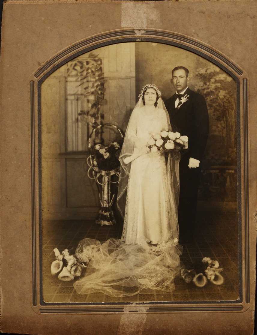 A person and person in wedding attire

Description automatically generated