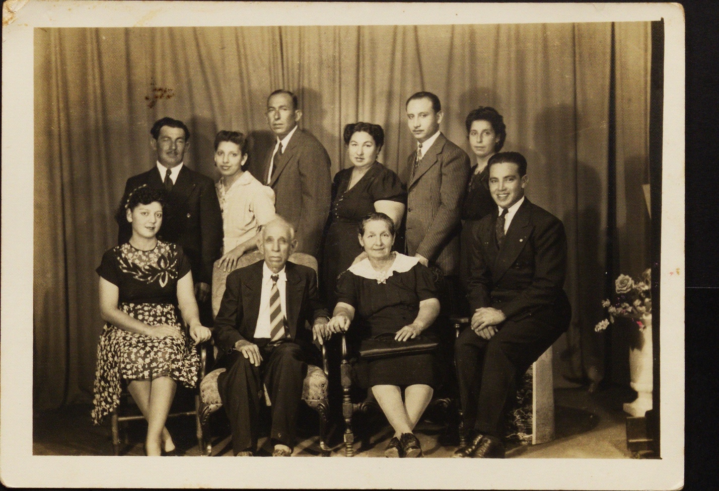 A group of people posing for a photo

Description automatically generated